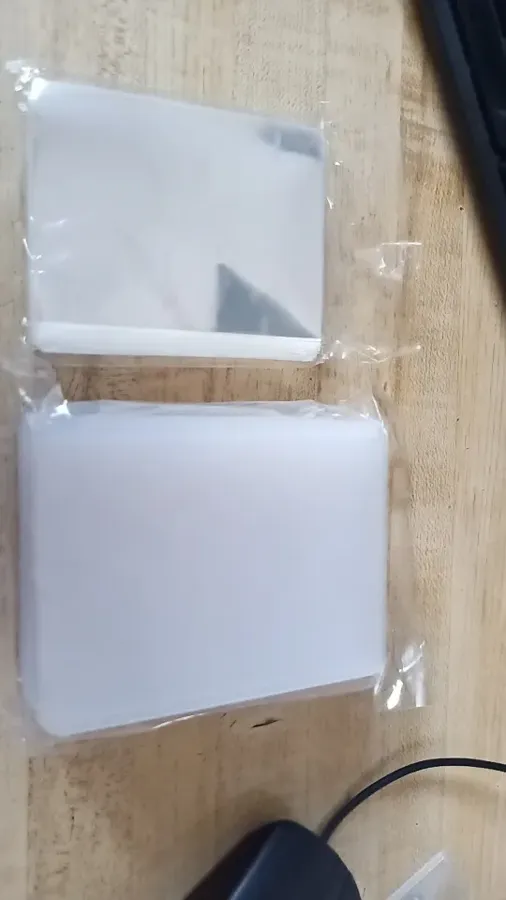 Buyer photo from a verified 25 toploaders + 100 sleeves combo order